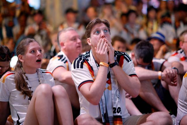 Germany fans react during a watch party for the 2026 World Cup football tournament match between Ecuador and Germany, at German House of Soccer, in New York City, on June 25, 2026. (Photo by Leonardo MUNOZ / AFP)