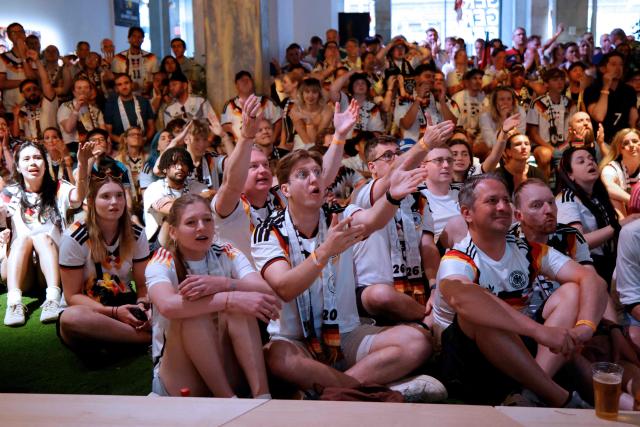 Germany fans react during a watch party for the 2026 World Cup football tournament match between Ecuador and Germany, at German House of Soccer, in New York City, on June 25, 2026. (Photo by Leonardo MUNOZ / AFP)
