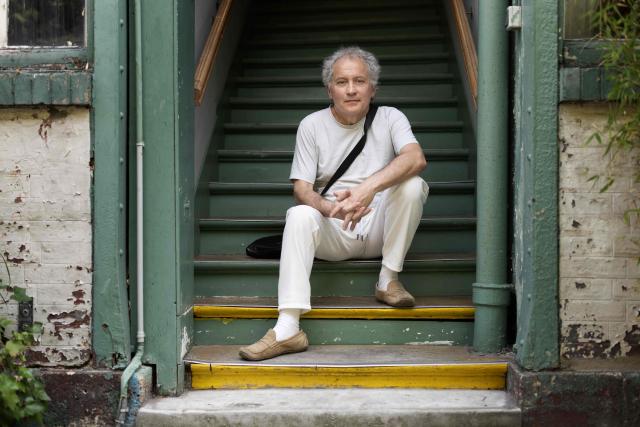 (FILES) French criminal and academic, famous for being sentenced to the guillotine for murder in 1980, then pardoned by the French President François Mitterrand in 1981, Philippe Maurice, poses during a photo session in Paris on June 19, 2026. From bank robberies to the hushed corridors of the National Archives: Philippe Maurice, Frances last person sentenced to death, who was spared the guillotine by a presidential pardon granted by François Mitterrand in May 1981, threw himself wholeheartedly into his studies before becoming a renowned medieval historian. (Photo by Joel Saget / AFP)