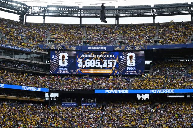 A screen shows the total attendance at the 2026 World Cup marking a world record during the 2026 World Cup Group E football match between Ecuador and Germany at the New York/New Jersey Stadium in East Rutherford on June 25, 2026. (Photo by Jewel SAMAD / AFP)