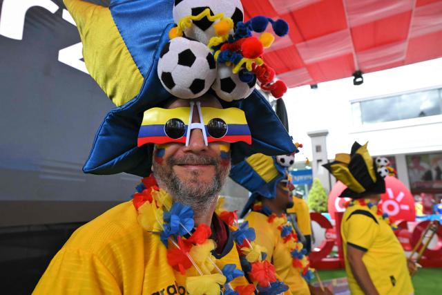 Fans of Ecuador FIFA World Cup football match between Ecuador and Germany at a Fan Fest in northern Quito, on June 25, 2026. (Photo by Rodrigo BUENDIA / AFP)