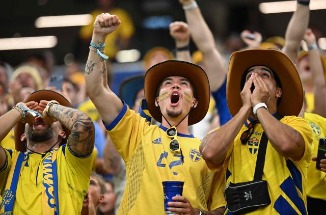 Sweden fans cheer ahead of the 2026 World Cup Group F football match between Japan and Sweden at the Dallas Stadium in Arlington on June 25, 2026.  (Photo by Paul ELLIS / AFP)