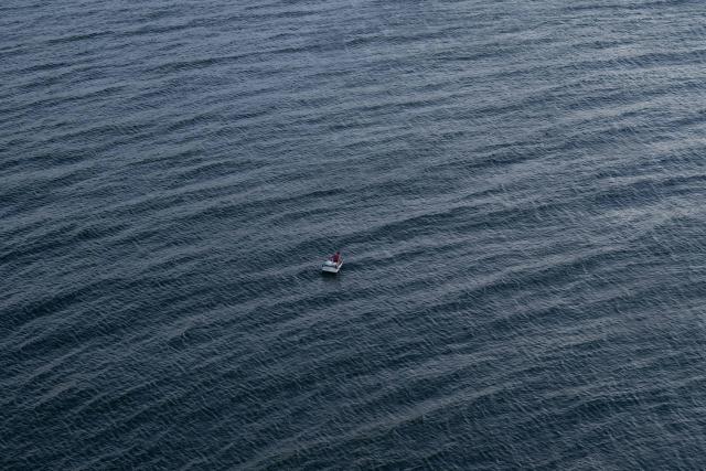 A fisherman rows towards the entrance to Havana Bay near the Morro Lighthouse in Havana on June 24, 2026. (Photo by Pablo PORCIUNCULA / AFP)