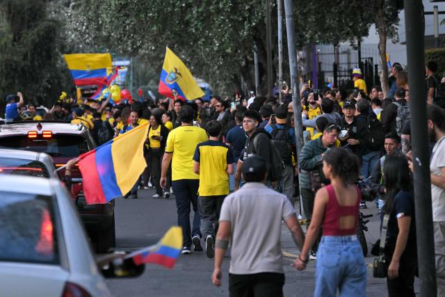 Fans of Ecuador celebrate in the streets of northern Quito on June 25, 2026, after their team defeated Germany 2-1 and advanced to the last 32 of the FIFA World Cup. (Photo by Rodrigo BUENDIA / AFP)