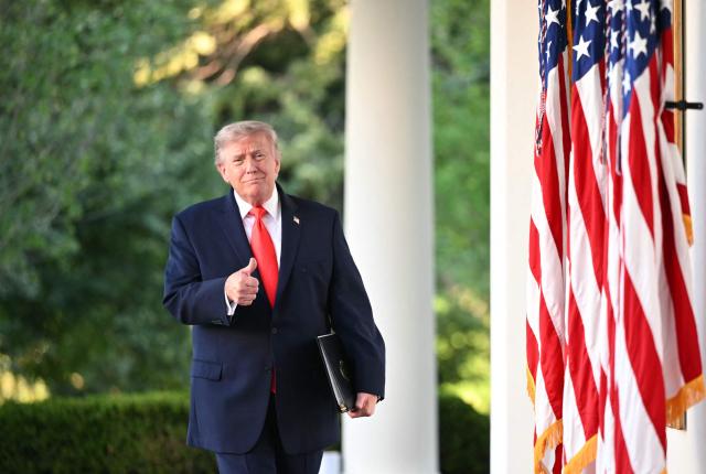 US President Donald Trump arrives to speak during a Rose Garden Club dinner with American farmers at the White House in Washington, DC, on June 25, 2026. (Photo by Mandel NGAN / AFP)