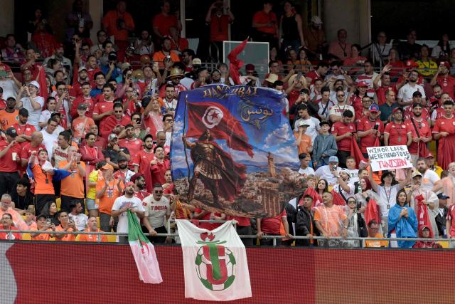 Tunisia's fans cheer their team ahead the 2026 World Cup Group F football match between Tunisia and the Netherlands at the Kansas City Stadium in Kansas City on June 25, 2026.  (Photo by Juan MABROMATA / AFP)