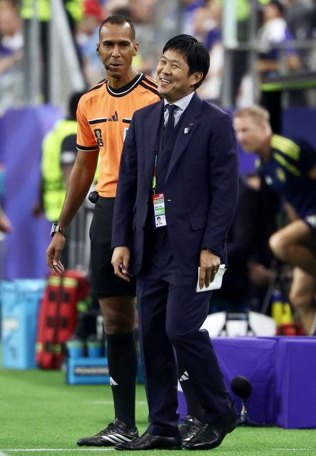 Japan's head coach Hajime Moriyasu gestures during the 2026 World Cup Group F football match between Japan and Sweden at the Dallas Stadium in Arlington on June 25, 2026.  (Photo by Aric Becker / AFP)