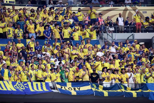 Sweden fans cheer during the 2026 World Cup Group F football match between Japan and Sweden at the Dallas Stadium in Arlington on June 25, 2026.  (Photo by Aric Becker / AFP)