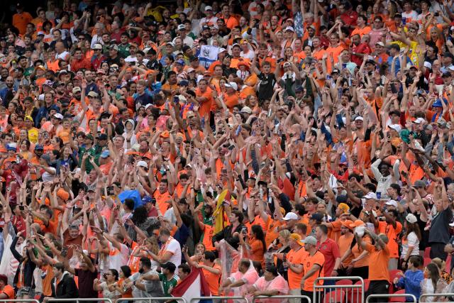 Netherlands' fans cheer their team during the 2026 World Cup Group F football match between Tunisia and the Netherlands at the Kansas City Stadium in Kansas City on June 25, 2026.  (Photo by Juan MABROMATA / AFP)