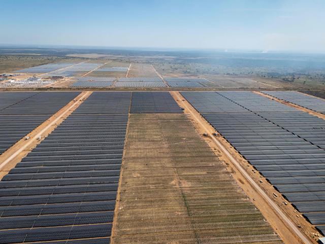 An aerial view of a solar power plant operated by the mining company Kamoa Copper S.A. in Kolwezi, in the southeastern part of the Democratic Republic of the Congo on on May 20, 2026, In vast warehouses at the Kamoa copper mine in the southeastern DR Congo, mountains of reddish rocks pile up as the machines grind away day and night.
As big as a small country, the deposit is one of the Democratic Republic of Congo's hidden treasures -- the centre of a global race for critical minerals.
In the ultra-modern installations, thousands of workers churn out the red gold -- coveted by international markets for its exceptionally high copper content.
China has long been mining it and now, too, the United States is vying for a share, seeking to challenge Beijing's hold on the strategic minerals used to make cars, phones and weapons. (Photo by GLODY MURHABAZI / AFP)