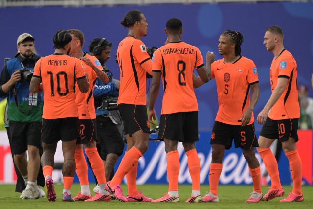 (From L) Netherlands' forward #10 Memphis Depay, defender #04 Virgil van Dijk, midfielder #08 Ryan Gravenberch, defender #05 Nathan Ake and midfielder #20 Teun Koopmeiners celebrate after winning the 2026 World Cup Group F football match between Tunisia and the Netherlands at the Kansas City Stadium in Kansas City on June 25, 2026.  (Photo by Juan MABROMATA / AFP)