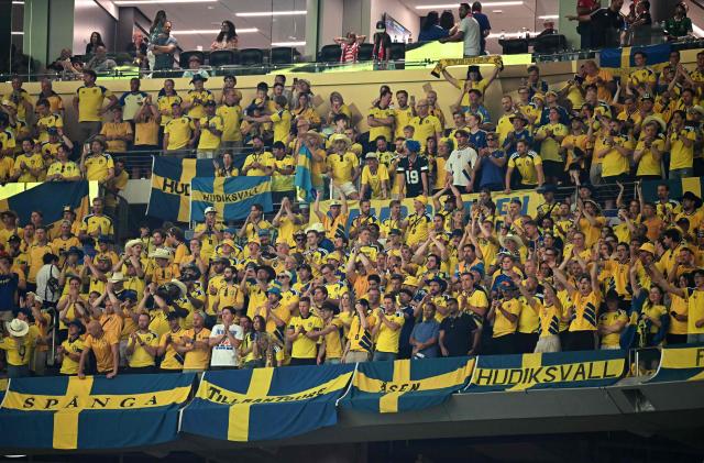 Sweden fans celebrate at the end of the 2026 World Cup Group F football match between Japan and Sweden at the Dallas Stadium in Arlington on June 25, 2026.  (Photo by Paul ELLIS / AFP)