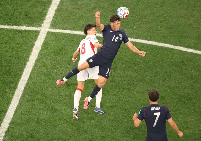 Turkey's midfielder #08 Arda Guler and US midfielder #14 Sebastian Berhalter fight for the ball during the 2026 World Cup Group D football match between Turkey and USA at the Los Angeles Stadium in Inglewood on June 25, 2026.  (Photo by Etienne LAURENT / AFP)