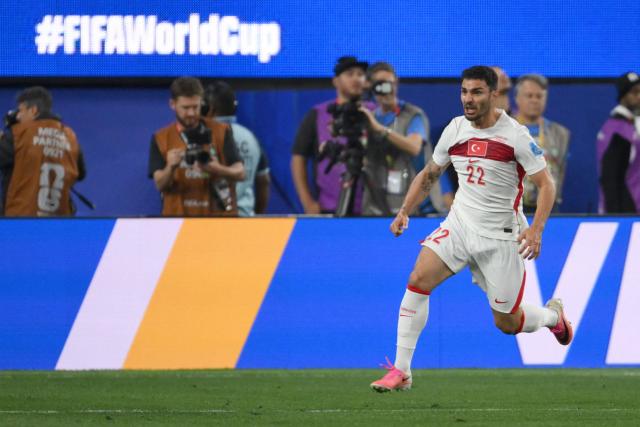 Turkey's defender #22 Kaan Ayhan celebrates after scoring his team’s third goal during the 2026 World Cup Group D football match between Turkey and USA at the Los Angeles Stadium in Inglewood on June 25, 2026.  (Photo by Patrick T. FALLON / AFP)