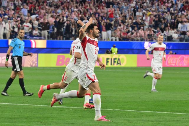 Turkey's defender #22 Kaan Ayhan celebrates after scoring his team’s third goal during the 2026 World Cup Group D football match between Turkey and USA at the Los Angeles Stadium in Inglewood on June 25, 2026.  (Photo by Frederic J. BROWN / AFP)