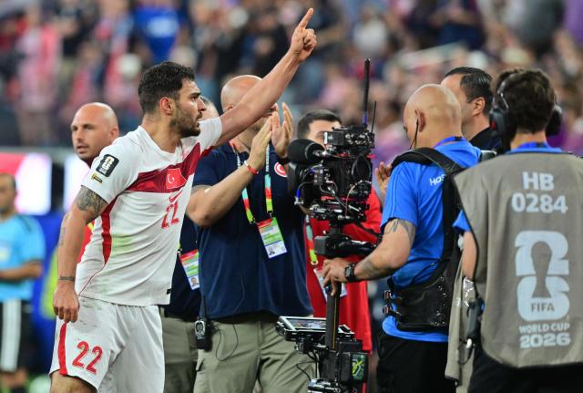 Turkey's defender #22 Kaan Ayhan celebrates after scoring his team’s third goal during the 2026 World Cup Group D football match between Turkey and USA at the Los Angeles Stadium in Inglewood on June 25, 2026.  (Photo by Frederic J. BROWN / AFP)