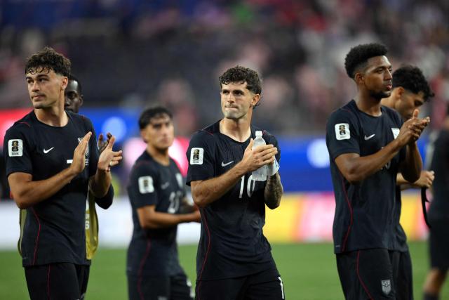 US forward #10 Christian Pulisic (C) reacts at the end of the 2026 World Cup Group D football match between Turkey and USA at the Los Angeles Stadium in Inglewood on June 25, 2026.  (Photo by Patrick T. FALLON / AFP)