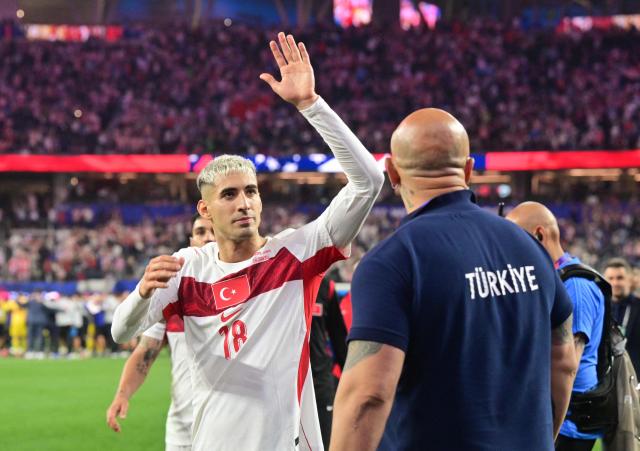 Turkey's defender #18 Mert Muldur waves at the end of the during the 2026 World Cup Group D football match between Turkey and USA at the Los Angeles Stadium in Inglewood on June 25, 2026.  (Photo by Frederic J. BROWN / AFP)