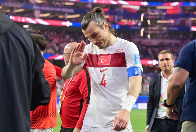 Turkey's defender #04 Caglar Soyuncu reacts after winning the during the 2026 World Cup Group D football match between Turkey and USA at the Los Angeles Stadium in Inglewood on June 25, 2026.  (Photo by Frederic J. BROWN / AFP)