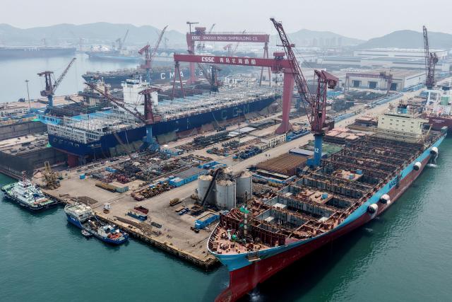 This aerial photo shows the Qingdao Beihai Shipyard in Qingdao, China’s eastern Shandong province on June 25, 2026. (Photo by CN-STR / AFP) / China OUT
