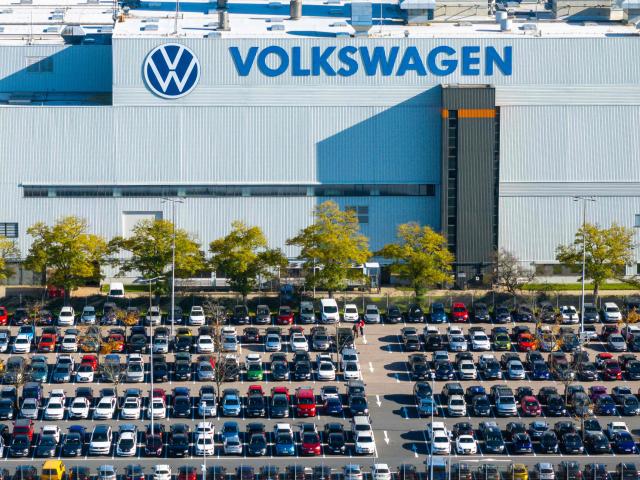 (FILES) Aerial view taken on October 28, 2024 shows the plant of German car maker Volkswagen (VW) in Zwickau, eastern Germany. According to a media report on June 26, 2026, the car manufacturer Volkswagen plans to cut up to 100,000 jobs. Four plants in Germany are to be closed, the "Manager Magazin" reported, citing insiders. In addition, VW CEO Oliver Blume is reportedly planning to spin off the core Volkswagen brand into a new company. According to the report, the job cuts are planned worldwide. (Photo by AFP)
