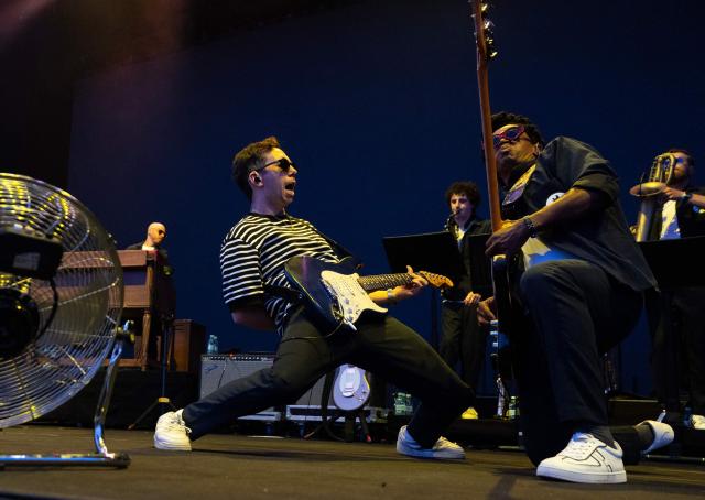 US guitarist and composer Cory Wong (L) and US bassist Sonny T perform during the "Noches del Botanico" festival in Madrid, on June 25, 2026. (Photo by Pierre-Philippe MARCOU / AFP)