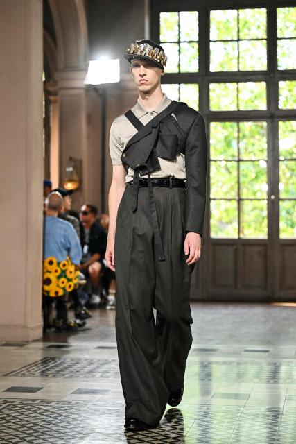 A model presents a creation by Junya Watanabe for the Menswear Spring/Summer 2027 collection fashion show as part of the Paris Fashion Week, in Paris on June 26, 2026. (Photo by JULIEN DE ROSA / AFP)