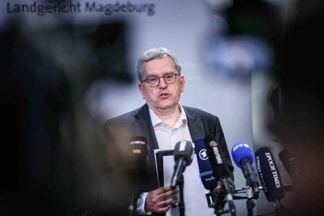 Press spokesperson for the Regional Court of Magdeburg Christian Loeffler gives a press statement in the temporary courtroom in Magdeburg, eastern Germany on June 26, 2026, during the trial against Saudi Arabian defendant Taleb Jawad al-Abdulmohsen over the deadly Christmas market attack in December 2024. The court sentenced to life in jail the Saudi psychiatrist who drove an SUV through a crowded Christmas market in 2024, killing six people and injuring more than 300. (Photo by Ronny HARTMANN / AFP)
