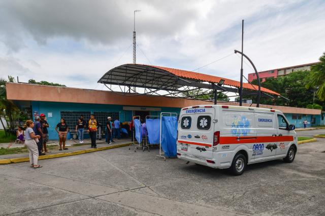 Rescue workers and paramedics set up a care center following twin earthquakes in Moron, Carabobo State on June 26, 2026. Rescuers used heavy machinery and their bare hands on June 26 in a race to save survivors of deadly twin earthquakes in Venezuela that killed at least 235 people, hurt thousands and flattened scores of buildings. (Photo by Orlando Obispo / AFP)