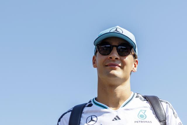 Mercedes' British driver George Russell arrives for the first practice session at the Red Bull Ring race track in Spielberg, Austria on June 26, 2026, ahead of the Formula One Austrian Grand Prix. (Photo by ERWIN SCHERIAU / APA / AFP) / Austria OUT