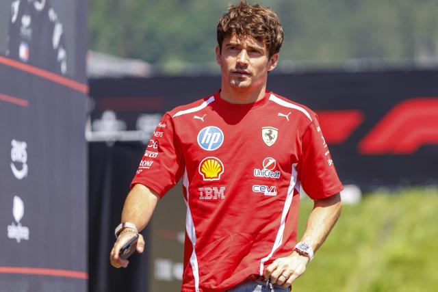 Ferrari's Monegasque driver Charles Leclerc arrives for the first practice session at the Red Bull Ring race track in Spielberg, Austria on June 26, 2026, ahead of the Formula One Austrian Grand Prix. (Photo by ERWIN SCHERIAU / APA / AFP) / Austria OUT