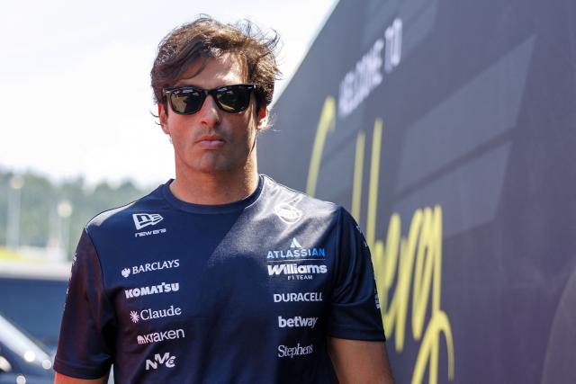 Williams' Spanish driver Carlos Sainz arrives for the first practice session at the Red Bull Ring race track in Spielberg, Austria on June 26, 2026, ahead of the Formula One Austrian Grand Prix. (Photo by ERWIN SCHERIAU / APA / AFP) / Austria OUT