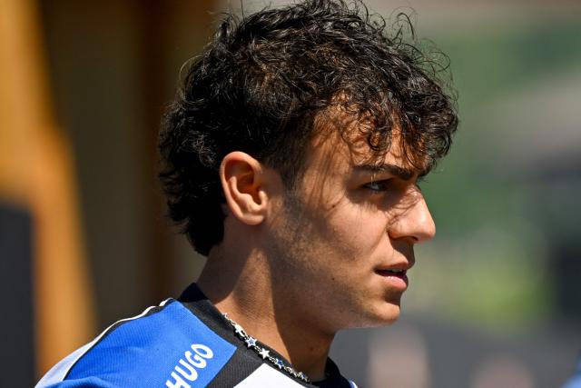 Racing Bulls' British driver Arvid Lindblad arrives to the paddock prior to the first practice session at the Red Bull Ring race track in Spielberg, Austria on June 26, 2026, ahead of the Formula One Austrian Grand Prix. (Photo by Andrej ISAKOVIC / AFP)