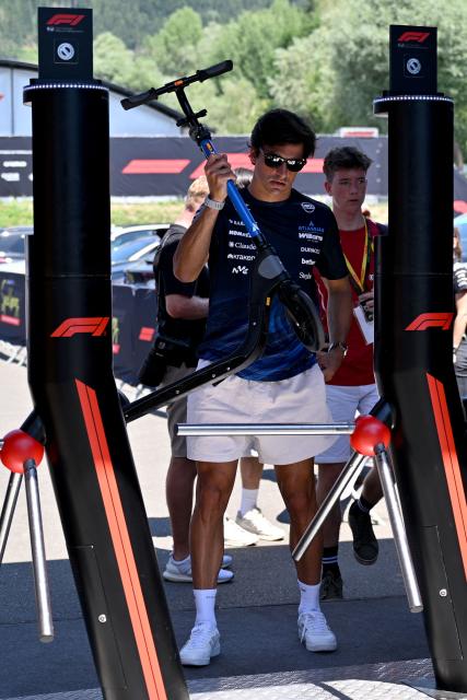 Williams' Spanish driver Carlos Sainz arrives to the paddock prior to the first practice session at the Red Bull Ring race track in Spielberg, Austria on June 26, 2026, ahead of the Formula One Austrian Grand Prix. (Photo by Andrej ISAKOVIC / AFP)