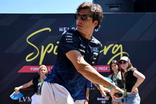 Williams' Spanish driver Carlos Sainz arrives to the paddock prior to the first practice session at the Red Bull Ring race track in Spielberg, Austria on June 26, 2026, ahead of the Formula One Austrian Grand Prix. (Photo by Andrej ISAKOVIC / AFP)