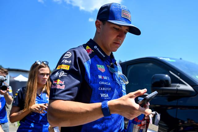 Red Bull Racing's French driver Isack Hadjar arrives to the paddock prior to the first practice session at the Red Bull Ring race track in Spielberg, Austria on June 26, 2026, ahead of the Formula One Austrian Grand Prix. (Photo by Andrej ISAKOVIC / AFP)