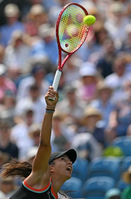 Croatia Petra Marcinko serves against US player Madison Keys during their women's semi-final tennis match on day five of the Lexus Eastbourne Open at Devonshire Park, Eastbourne, on the south coast of England on June 26, 2026. (Photo by Glyn KIRK / AFP)