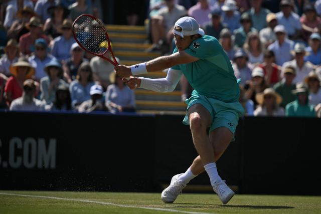 Belgium's Zizou Bergs returns to Britain's Toby Samuel during their men's semi-final tennis match on day five of the Lexus Eastbourne Open at Devonshire Park, Eastbourne, on the south coast of England on June 26, 2026. (Photo by Glyn KIRK / AFP)