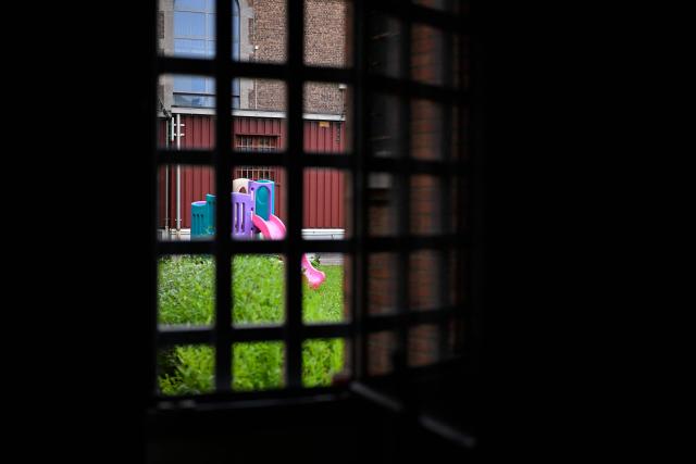 This general view shows a garden at a VHS out-of-surveillance visitroom of Namur prison on June 23, 2026. Sharing a cell with two others around the clock has become a “living hell” during the heatwave, inmates at Namur prison in Belgium told AFP, highlighting chronic overcrowding in the country’s penitentiary system. (Photo by JOHN THYS / AFP)