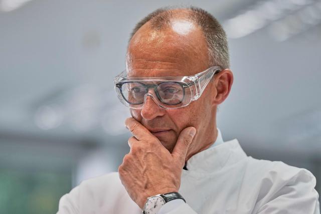 German Chancellor Friedrich Merz visits pharmaceutical company Salutas Pharma in Barleben, near Magdeburg, eastern Germany on June 26, 2026. (Photo by Matthias Schrader / POOL / AFP)