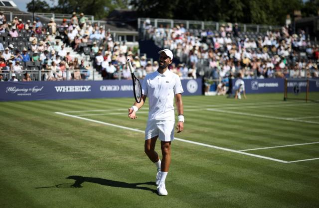 Serbia's Novak Djokovic spins his racquet as he plays against US player Tommy Paul ahead of their men's singles match on day four of the Giorgio Armani Tennis Classic tournament at the Hurlingham Club in London on June 26, 2026. (Photo by Henry NICHOLLS / AFP)