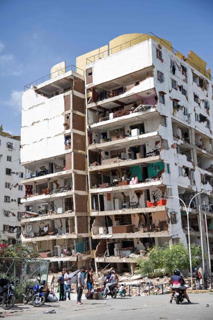 Picture of a building damaged during twin earthquakes in Caraballeda, La Guaira State, some 40 km northeast of Caracas, on June 25, 2026. The death toll from twin earthquakes in Venezuela more than doubled on June 26, 2026, to 589, interim president Delcy Rodriguez said, as rescuers boosted by international teams raced to find survivors beneath collapsed buildings. Over 50,000 people are missing after the earthquakes in Venezuela, a senior UN official told AFP. (Photo by Donaldo BARROS / AFP)