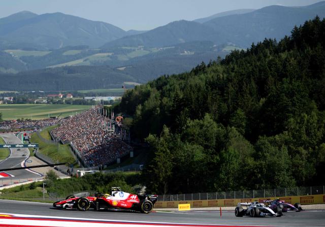 Ferrari's British driver Lewis Hamilton (L) drives during the second practice session at the Red Bull Ring race track in Spielberg, Austria on June 26, 2026, ahead of the Formula One Austrian Grand Prix. (Photo by Joe KLAMAR / AFP)