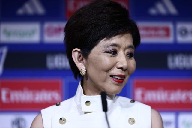 US businesswoman and President of Olympique Lyonnais Michele Kang looks on during a press conference at the Groupama Stadium in Decines-Charpieu near Lyon, central-eastern France, on June 26, 2026. The US businesswoman Michele Kang has become the majority shareholder of Olympique Lyonnais (Ligue 1), which she has been managing for the past year, according to Eagle Football Group, the club’s previous owner. (Photo by Alex MARTIN / AFP)