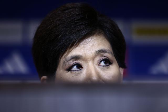 US businesswoman and President of Olympique Lyonnais Michele Kang looks on during a press conference at the Groupama Stadium in Decines-Charpieu near Lyon, central-eastern France, on June 26, 2026. The US businesswoman Michele Kang has become the majority shareholder of Olympique Lyonnais (Ligue 1), which she has been managing for the past year, according to Eagle Football Group, the club’s previous owner. (Photo by Alex MARTIN / AFP)