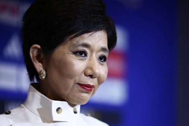 US businesswoman and President of Olympique Lyonnais Michele Kang looks on during a press conference at the Groupama Stadium in Decines-Charpieu near Lyon, central-eastern France, on June 26, 2026. The US businesswoman Michele Kang has become the majority shareholder of Olympique Lyonnais (Ligue 1), which she has been managing for the past year, according to Eagle Football Group, the club’s previous owner. (Photo by Alex MARTIN / AFP)