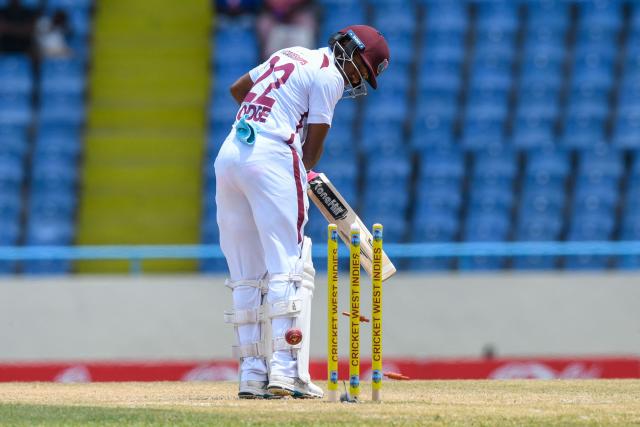 Kavem Hodge of West Indies bowled by Milan Rathnayake of Sri Lanka during the second day of the first Test cricket match between West Indies and Sri Lanka at Sir Vivian Richards Stadium in North Sound, Antigua and Barbuda, on June 26, 2026. (Photo by Randy Brooks / AFP)