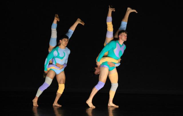 Dancers with Pilobolus, a modern dance and acrobatics company, perform a scene from "Virtuous and Vicious" during a dress rehearsal at the Joyce Theater in New York City on June 26, 2026. (Photo by TIMOTHY A. CLARY / AFP)