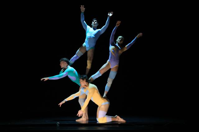 Dancers with Pilobolus, a modern dance and acrobatics company, perform a scene from "Virtuous and Vicious" during a dress rehearsal at the Joyce Theater in New York City on June 26, 2026. (Photo by TIMOTHY A. CLARY / AFP)