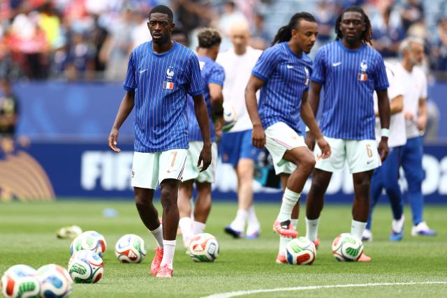 France's forward #07 Ousmane Dembele takes part in the warm-up ahead of the 2026 World Cup Group I football match between Norway and France at the Boston Stadium in Foxborough on June 26, 2026.  (Photo by CHARLY TRIBALLEAU / AFP)
